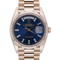 Rolex Day-Date 36 128235 with blue dial and 18ct rose gold case
