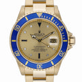 Rolex Submariner 16618 with champagne dial and 18ct yellow gold case